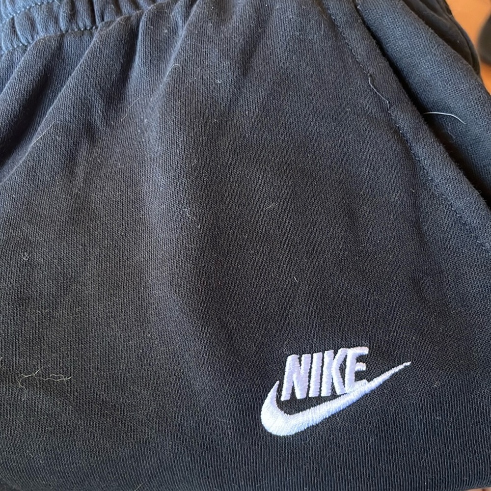 Black wide leg, Nike sweatpants size extra large, no rips or stains